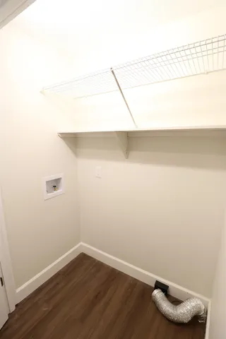 a view of a room with racks on the wall