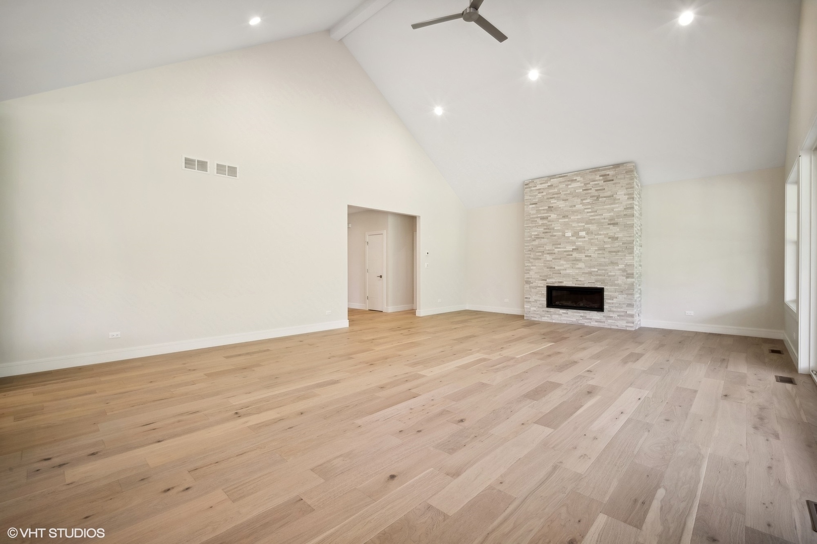 1223 Noble Drive Des Plaines, IL 60018 - Photo 18 of 52 a view of empty room with wooden floor and fan