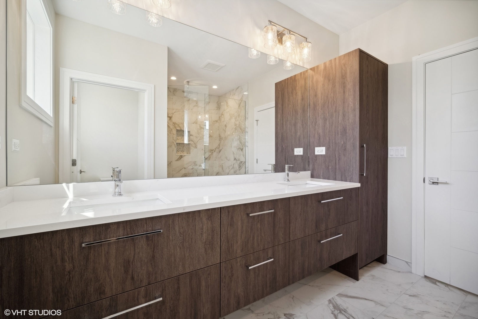 1223 Noble Drive Des Plaines, IL 60018 - Photo 27 of 52 a bathroom with a double vanity sink and mirror