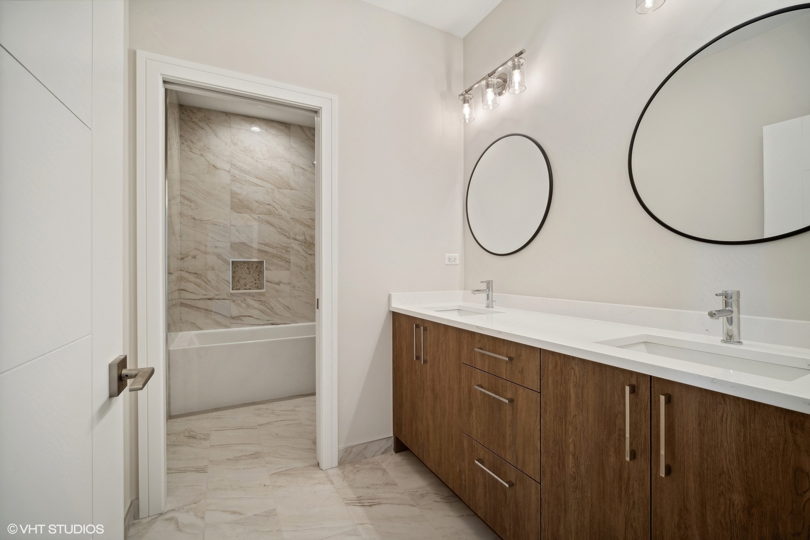 1223 Noble Drive Des Plaines, IL 60018 - Photo 33 of 52 a bathroom with a sink and a mirror