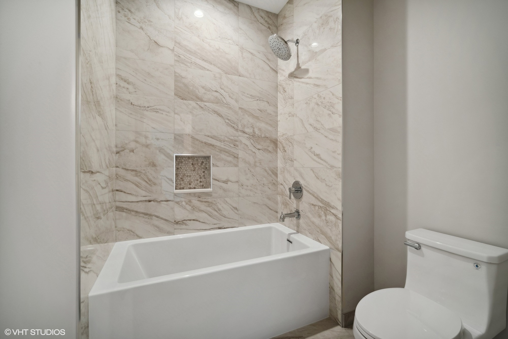 1223 Noble Drive Des Plaines, IL 60018 - Photo 34 of 52 a white bath tub sitting next to a white toilet