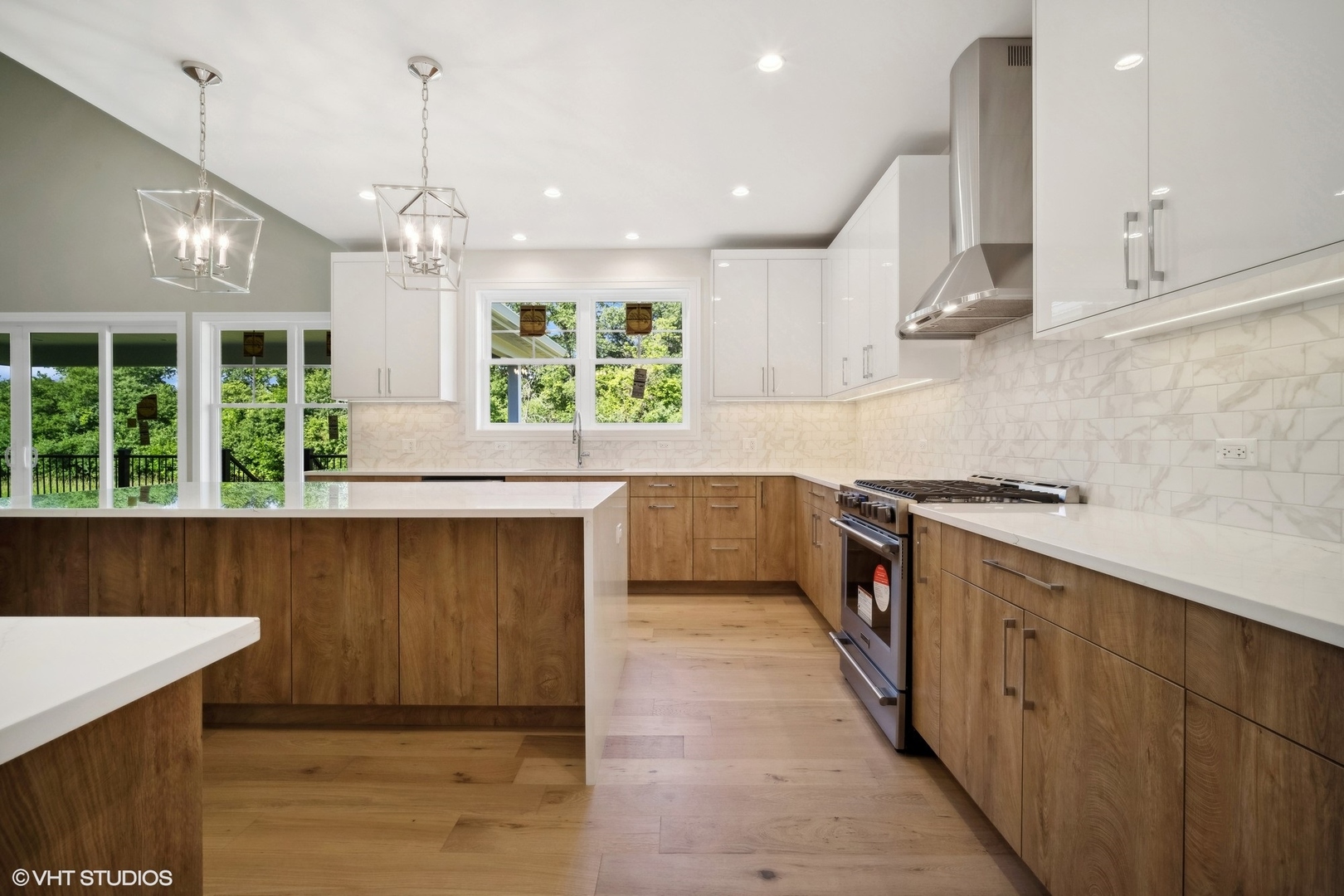1223 Noble Drive Des Plaines, IL 60018 - Photo 5 of 52 a open kitchen with stainless steel appliances granite countertop a sink a stove and a wooden floors