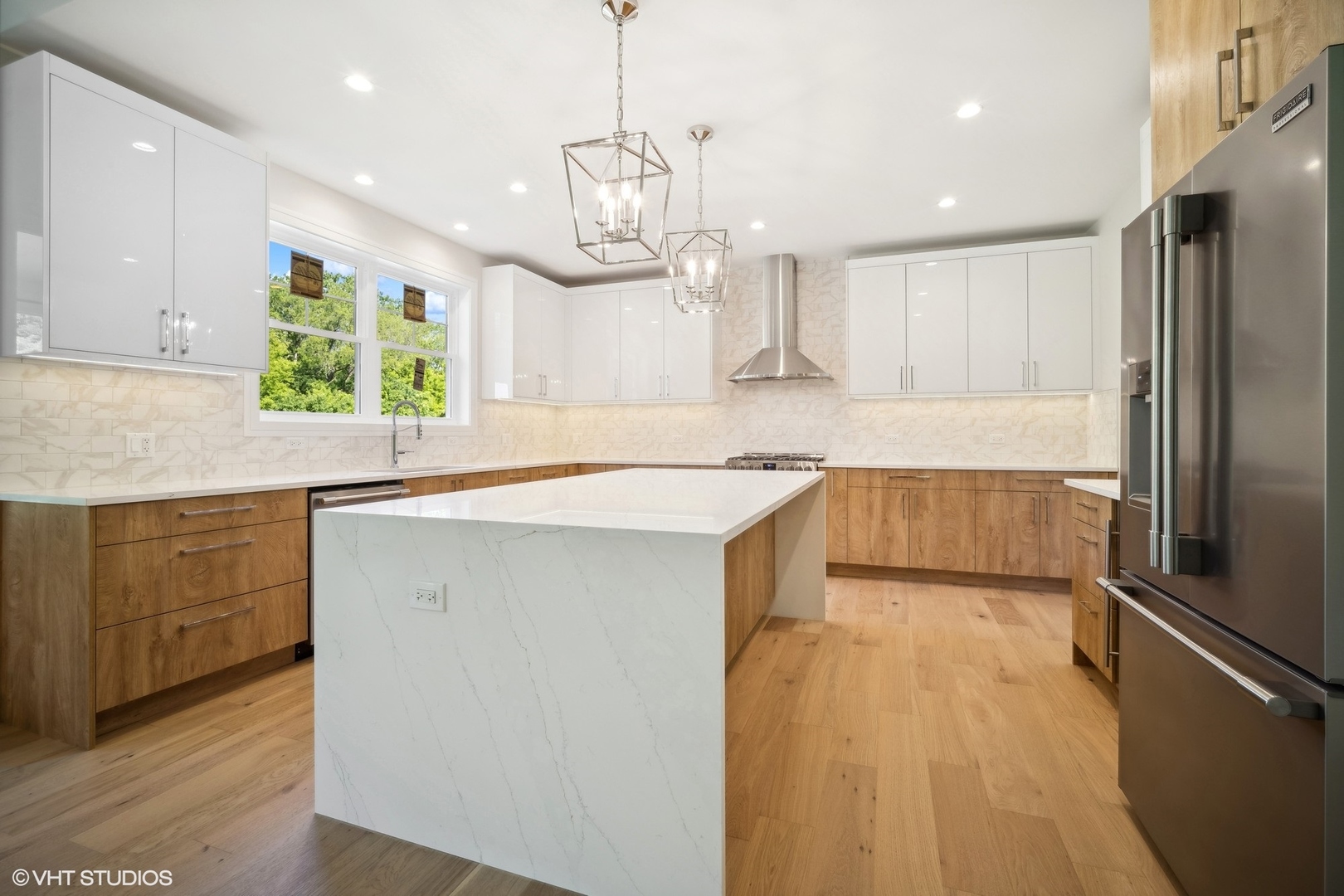 1223 Noble Drive Des Plaines, IL 60018 - Photo 6 of 52 a kitchen with kitchen island a large counter top space appliances and cabinets