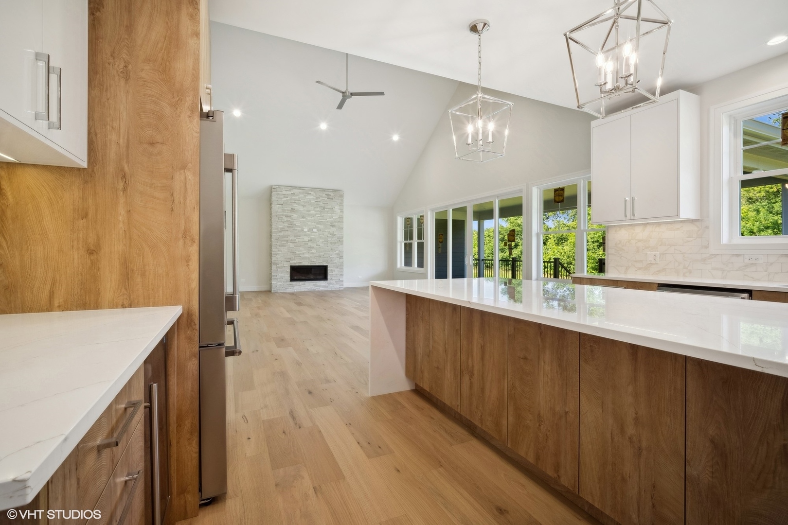 1223 Noble Drive Des Plaines, IL 60018 - Photo 8 of 52 a view of a kitchen with a sink and wooden cabinets