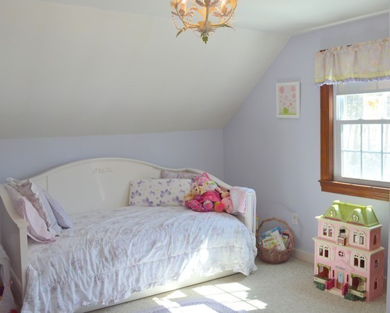 4 Hadley Road Framingham, MA 01701 - Photo 13 of 14 a bedroom with a bed and window