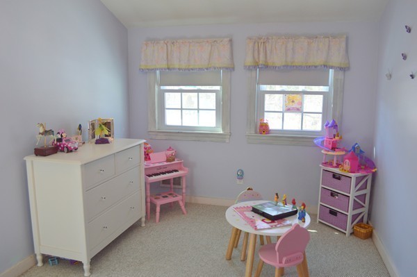 4 Hadley Road Framingham, MA 01701 - Photo 14 of 14 a bedroom with a bed and a dresser