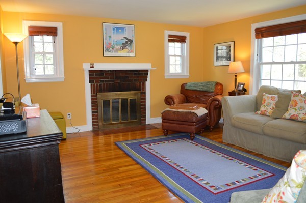 4 Hadley Road Framingham, MA 01701 - Photo 3 of 14 a living room with furniture and a fireplace
