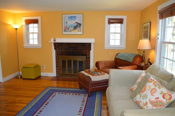 4 Hadley Road Framingham, MA 01701 - Photo 4 of 14 a living room with furniture and a fireplace