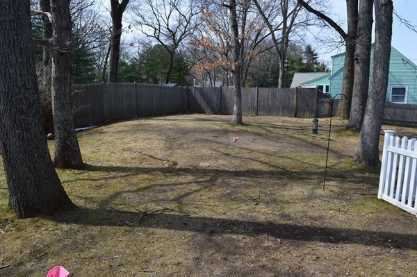 4 Hadley Road Framingham, MA 01701 - Photo 7 of 14 a backyard of a house