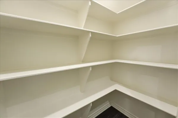 a kitchen with a sink and refrigerator