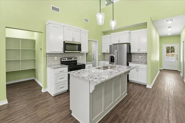 a view of room with washer and dryer