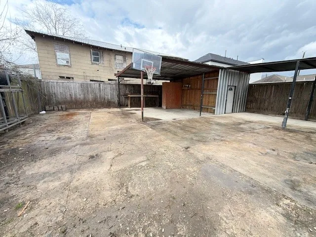 a house view with a backyard space