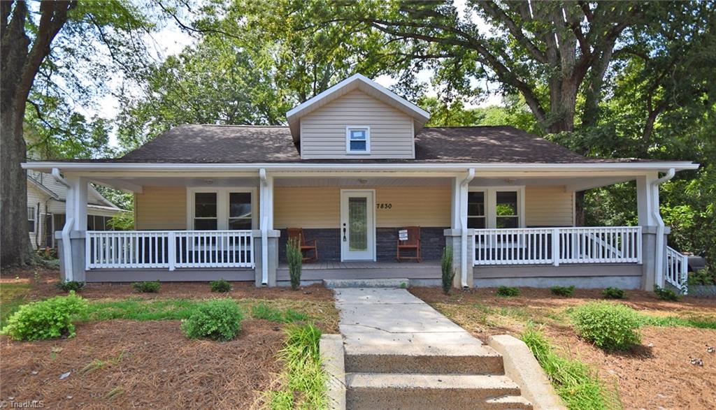 7830 Broad Street Rural Hall, NC 27045 - Photo 2 of 25 Howdy neighbors! You will love rocking the hours away on this wide and livable porch.