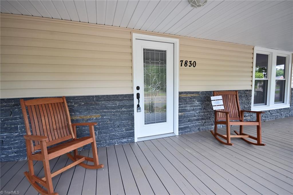 7830 Broad Street Rural Hall, NC 27045 - Photo 3 of 25 Wow! This porch is waiting to hear your story unfold.