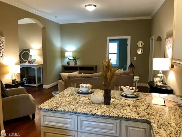 7830 Broad Street Rural Hall, NC 27045 - Photo 9 of 25 The open concept keeps everyone together.
