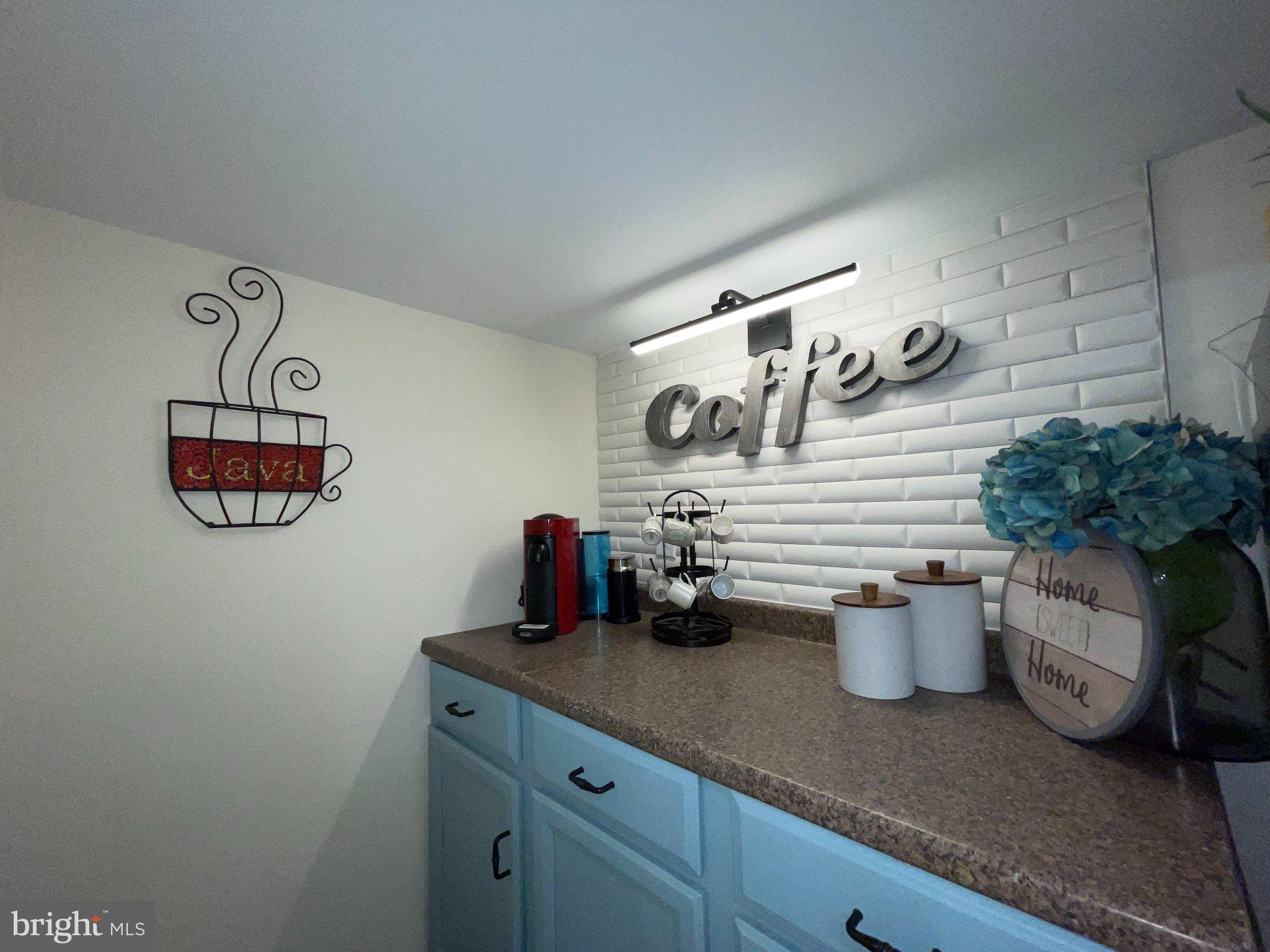 3712 West Cold Spring Lane Baltimore, MD 21215 - Photo 8 of 39 Charming coffee nook with stylish decor.