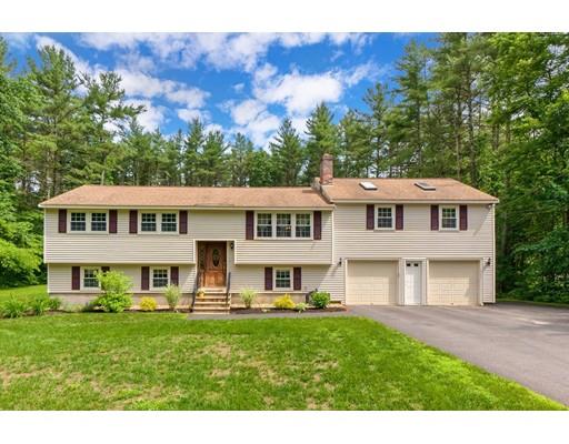 21 Bemis Road Pepperell, MA 01463 - Photo 1 of 27 a front view of a house with a yard