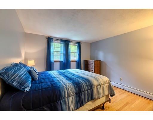 21 Bemis Road Pepperell, MA 01463 - Photo 12 of 27 a bedroom with a bed and window