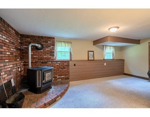 21 Bemis Road Pepperell, MA 01463 - Photo 18 of 27 a view of an empty room and window with wooden floor