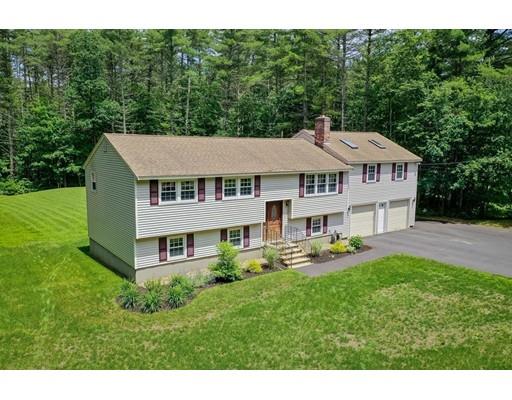 21 Bemis Road Pepperell, MA 01463 - Photo 3 of 27 a aerial view of a house with swimming pool and green space