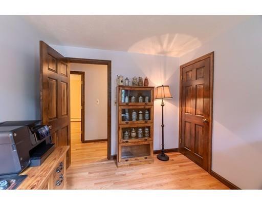 21 Bemis Road Pepperell, MA 01463 - Photo 10 of 27 a view of a livingroom with furniture and an empty room