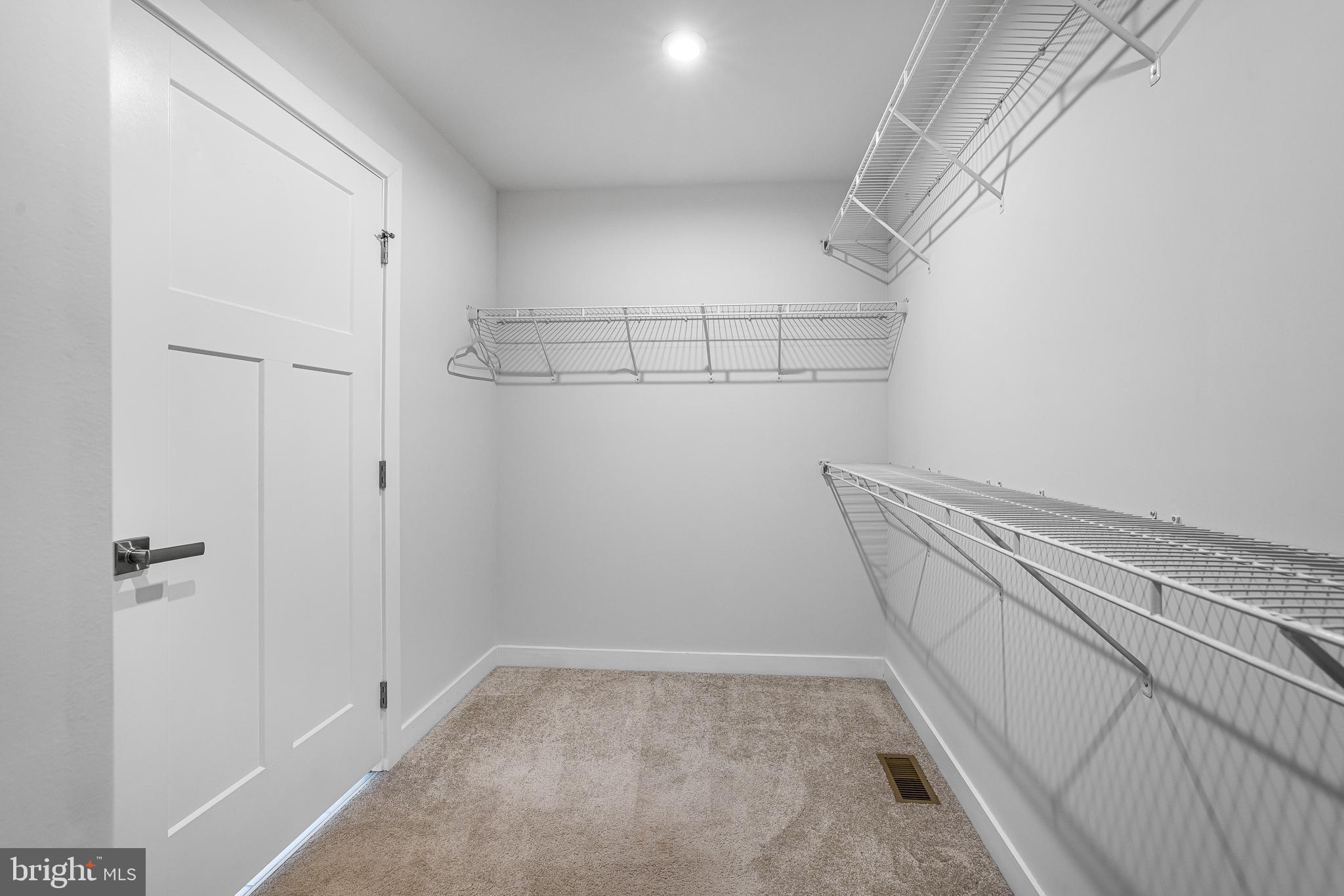 929 Robinson Road Townsend, DE 19734 - Photo 19 of 57 a view of a room with racks on the wall