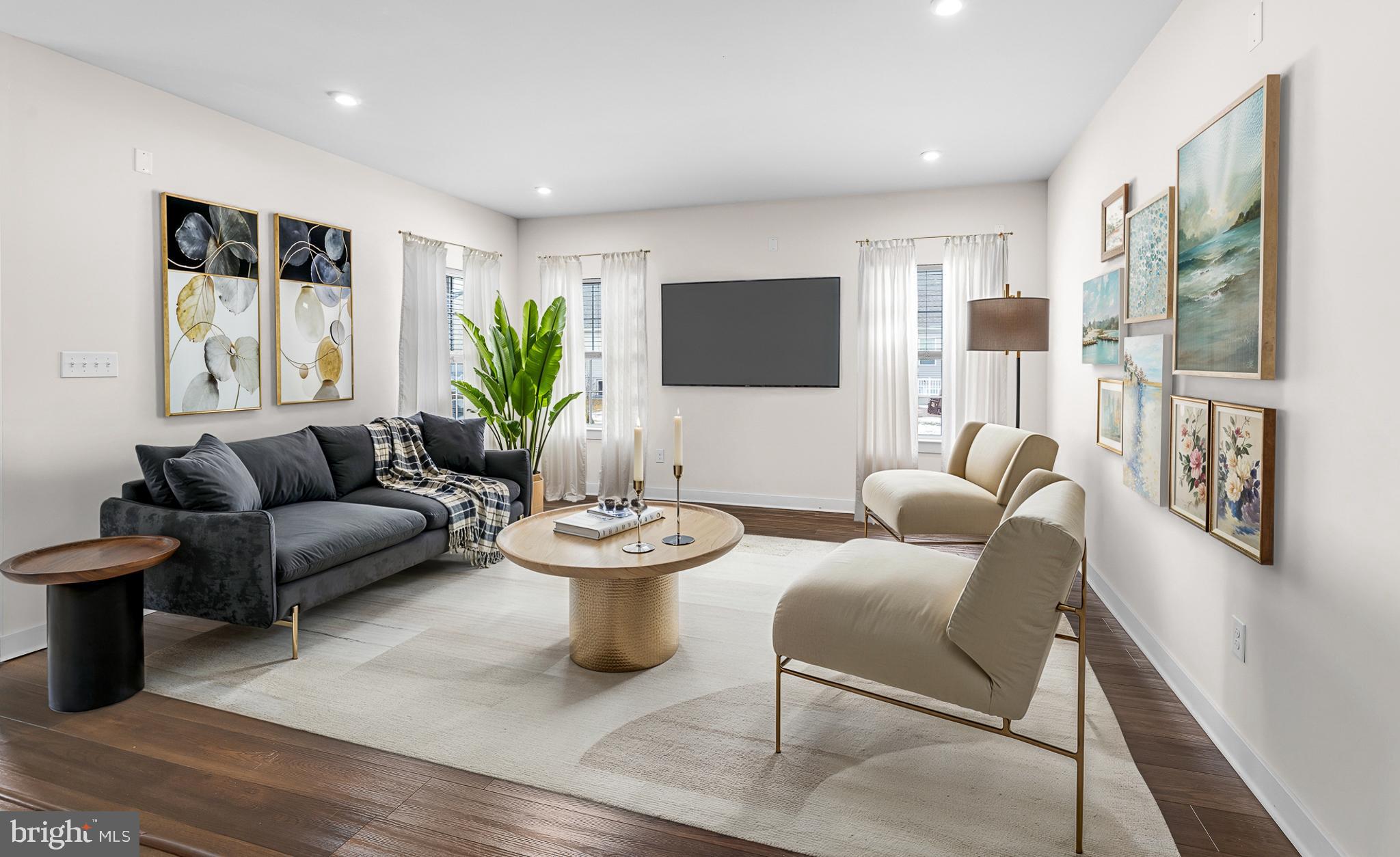 929 Robinson Road Townsend, DE 19734 - Photo 20 of 57 a living room with furniture and a flat screen tv