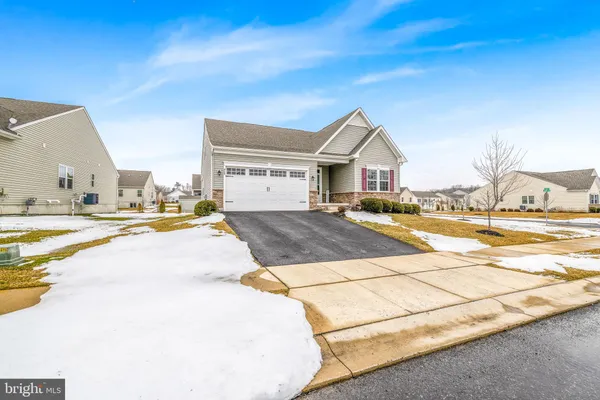 a view of a swimming pool with a lounge chairs