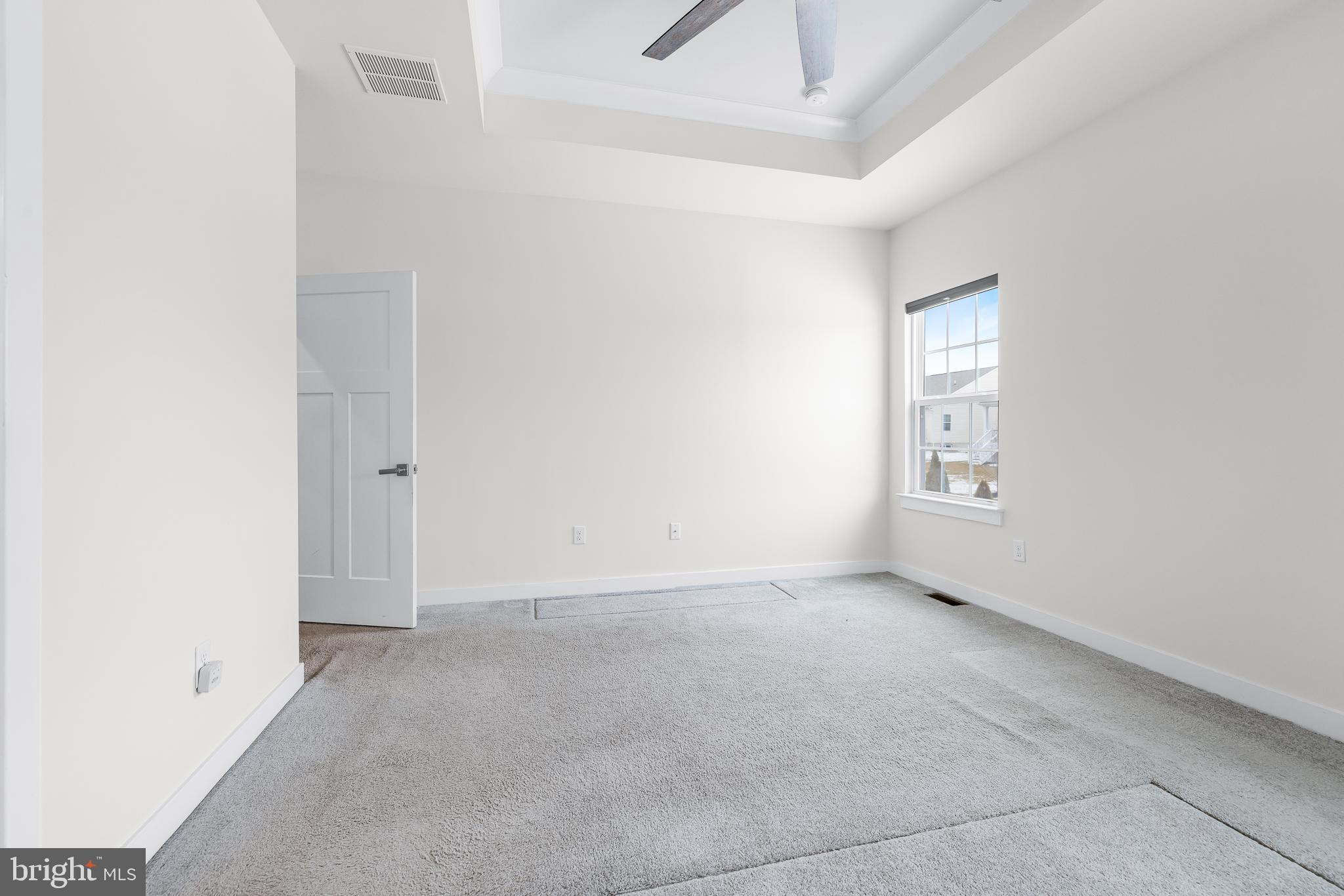 929 Robinson Road Townsend, DE 19734 - Photo 23 of 57 an empty room with windows