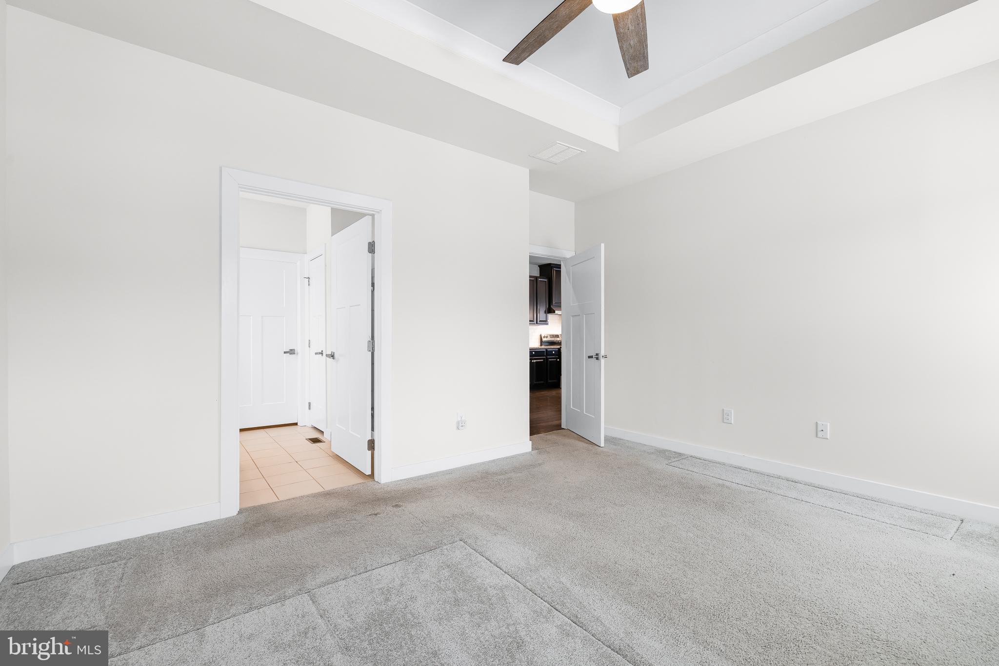 929 Robinson Road Townsend, DE 19734 - Photo 40 of 57 an empty room with closet and windows