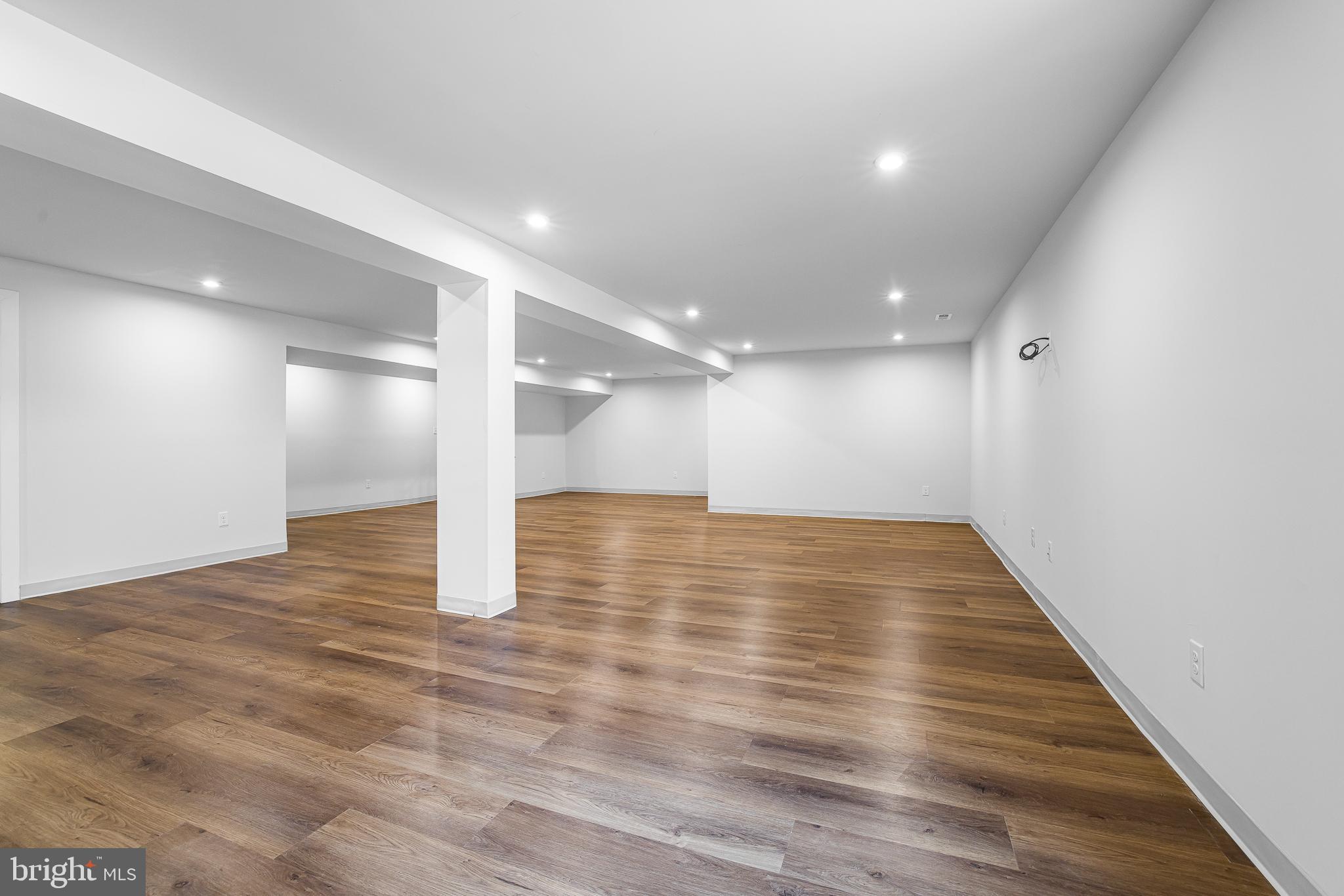 929 Robinson Road Townsend, DE 19734 - Photo 47 of 57 a view of empty room with wooden floor