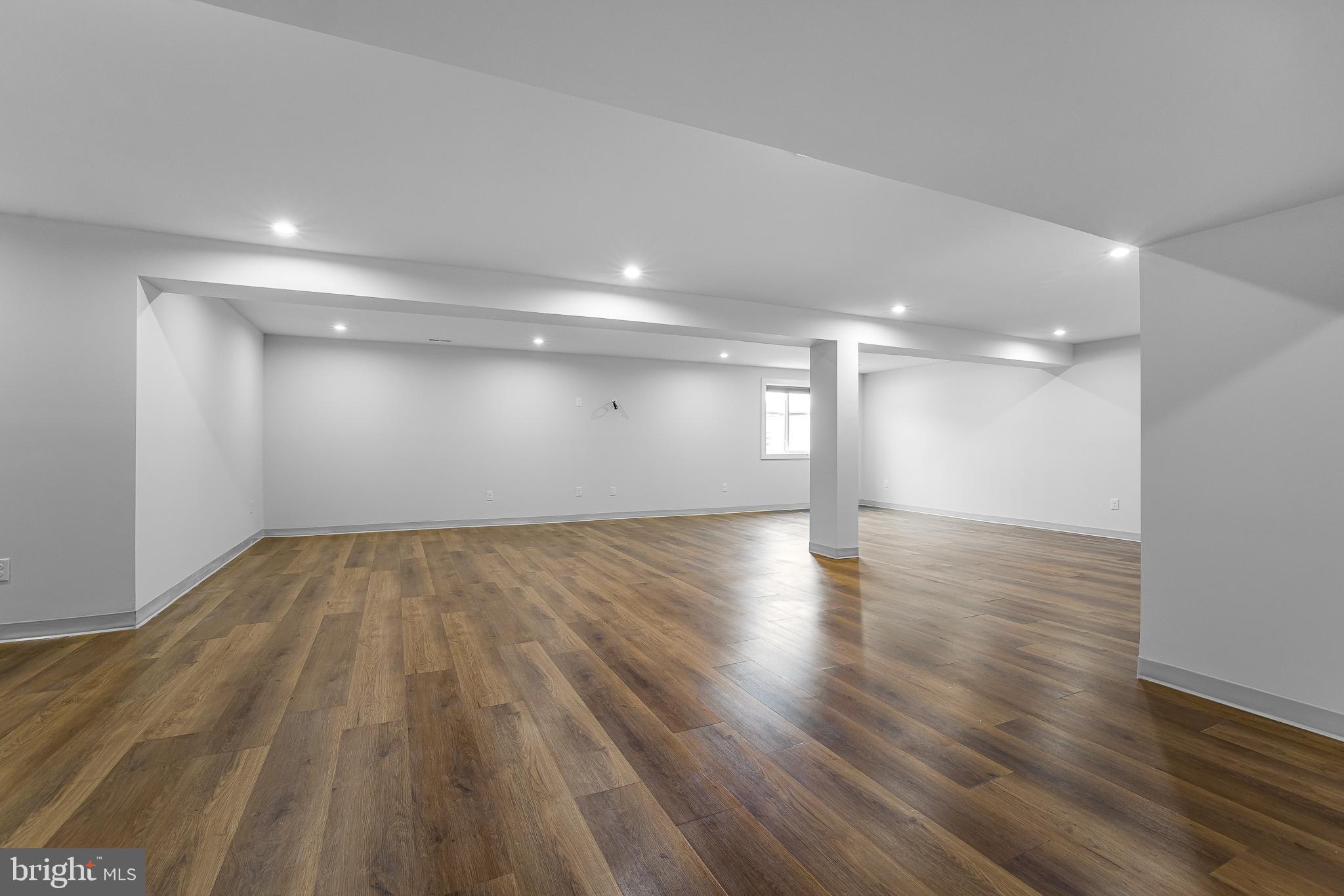 929 Robinson Road Townsend, DE 19734 - Photo 48 of 57 a view of empty room with wooden floor