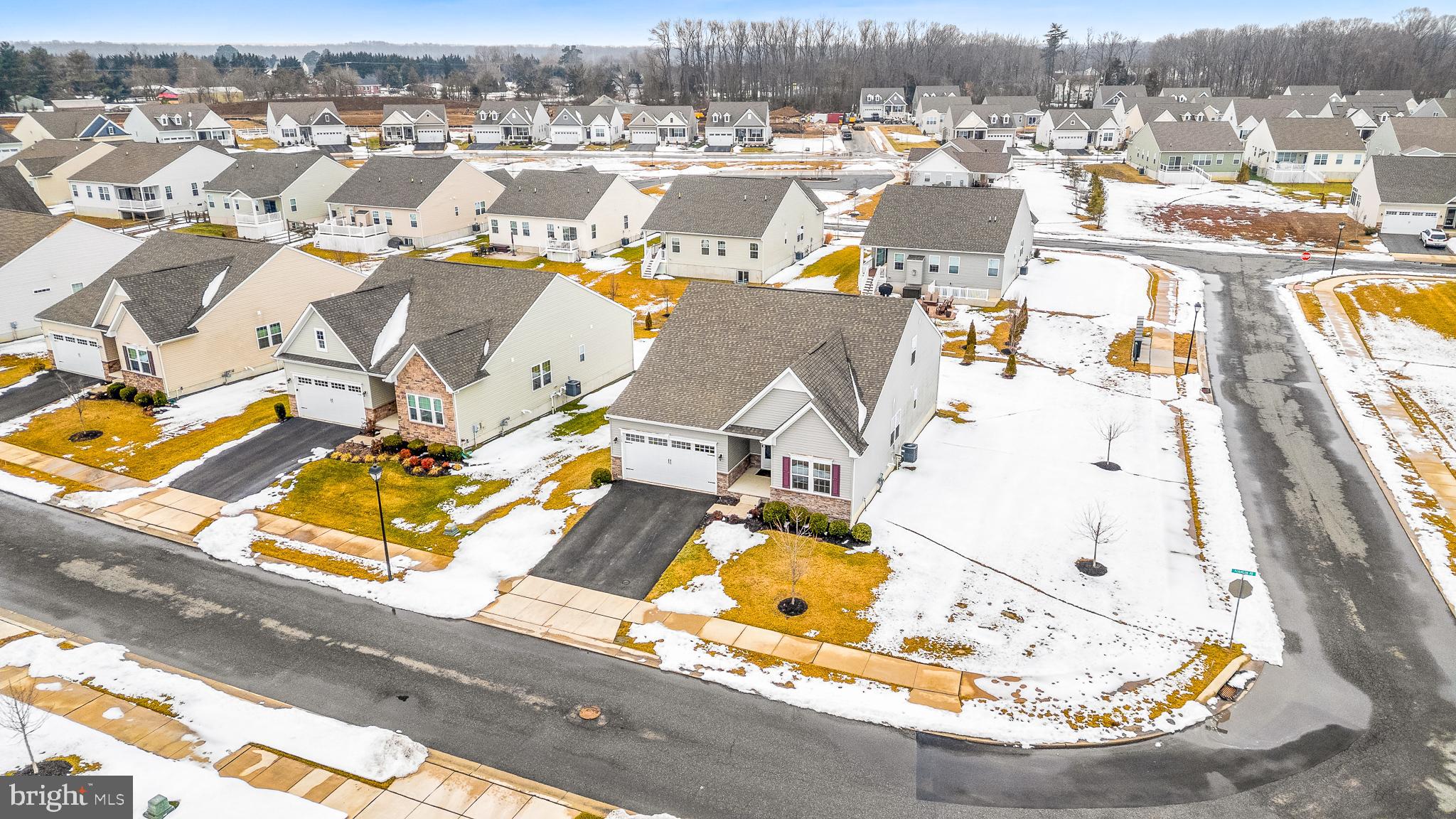 929 Robinson Road Townsend, DE 19734 - Photo 56 of 57 an aerial view of a swimming pool with outdoor seating