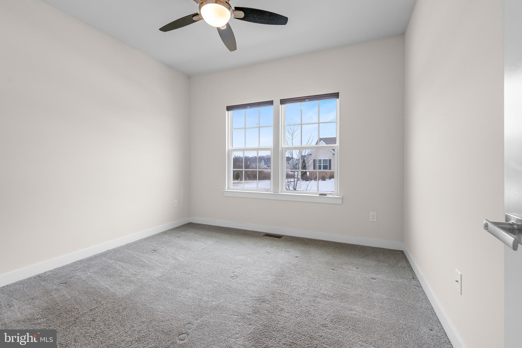 929 Robinson Road Townsend, DE 19734 - Photo 9 of 57 an empty room with a window