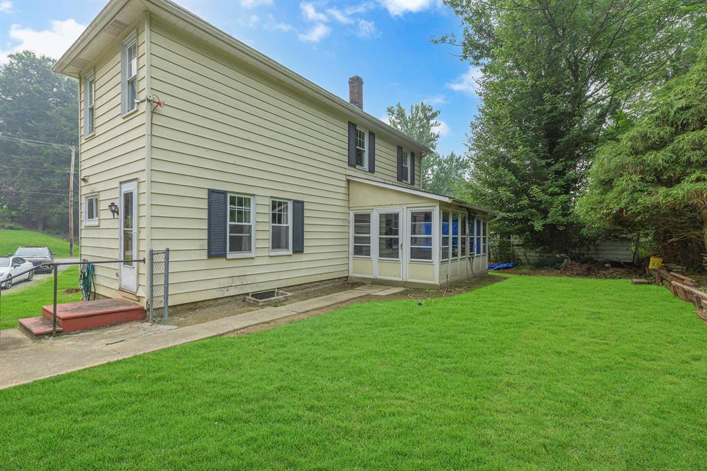 195 Highway 68 Rochester, PA 15074 - Photo 23 of 25 a view of a house with a backyard