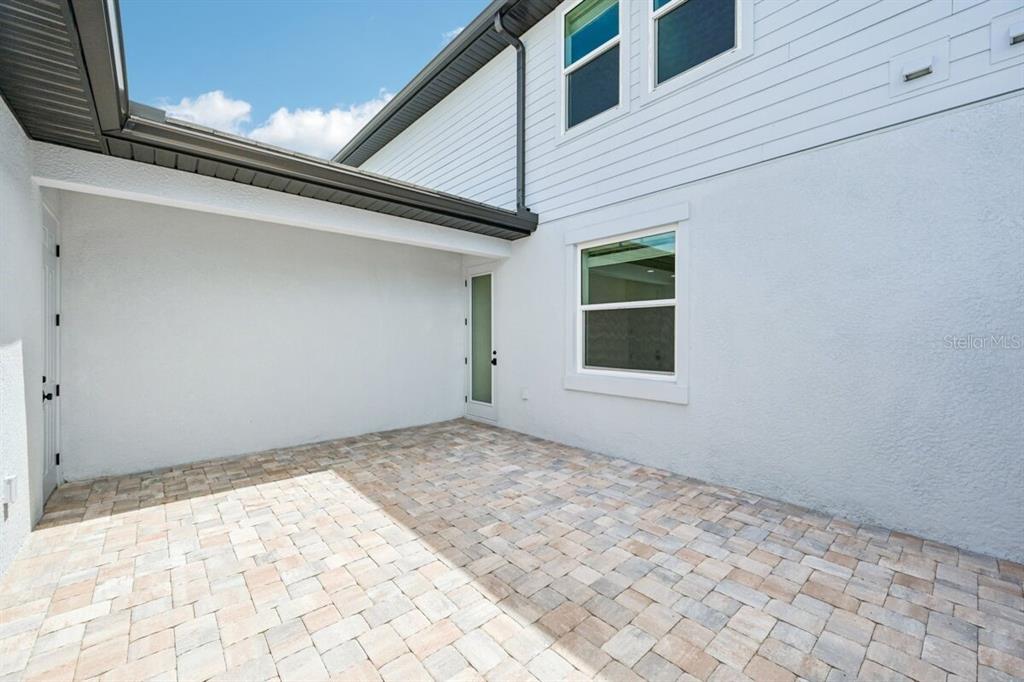 17712 Broadleaf Loop Venice, FL 34293 - Photo 18 of 23 a view of a backyard of a house