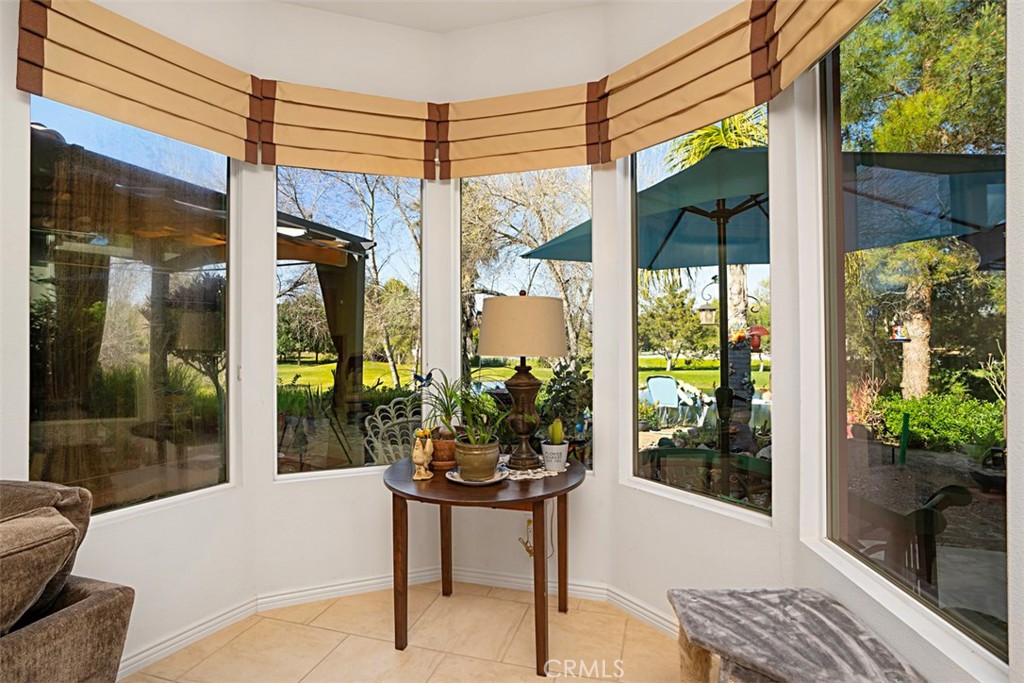 23858 Kaleb Drive Corona, CA 92883 - Photo 11 of 45 a outdoor living space with furniture and garden view