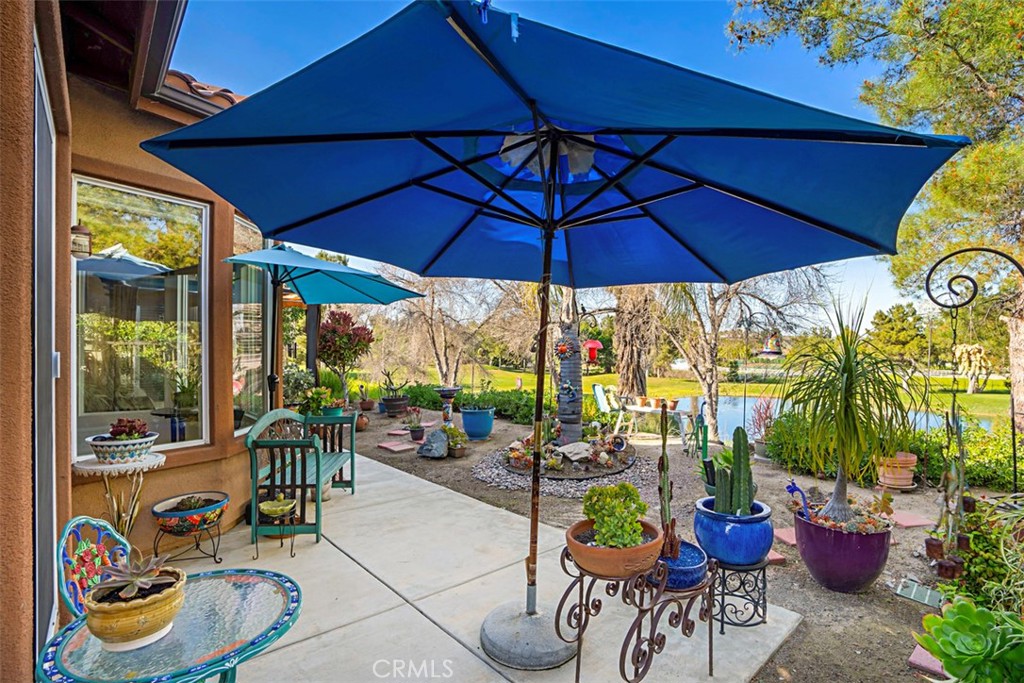 23858 Kaleb Drive Corona, CA 92883 - Photo 12 of 45 a view of a patio with couches and potted plants