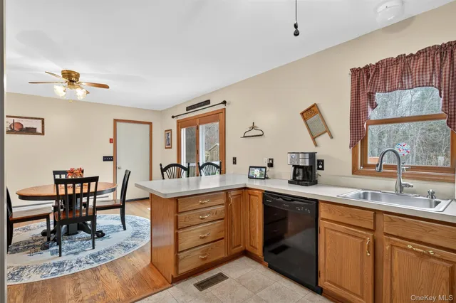 a view of a kitchen area with furniture and window