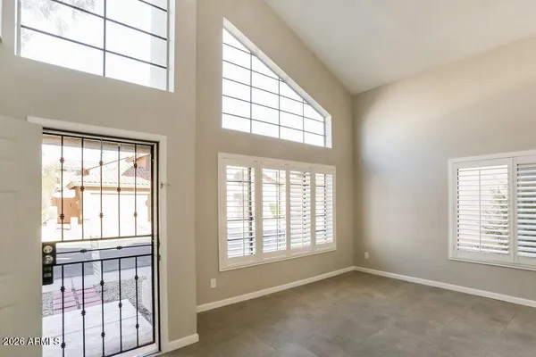 an empty room with windows