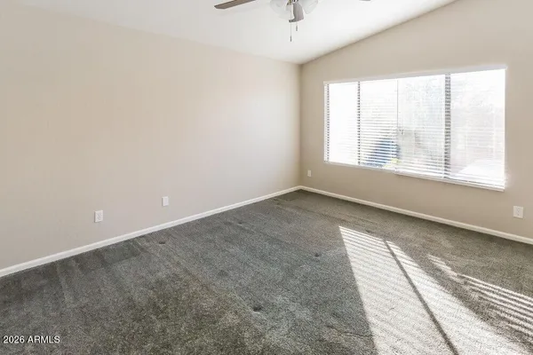 an empty room with windows