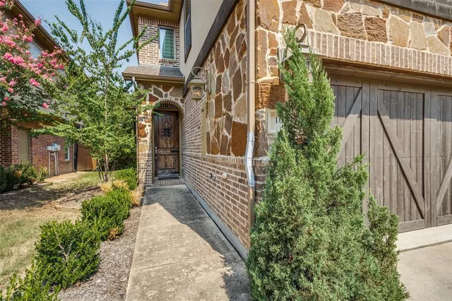 a view of a pathway both side of house