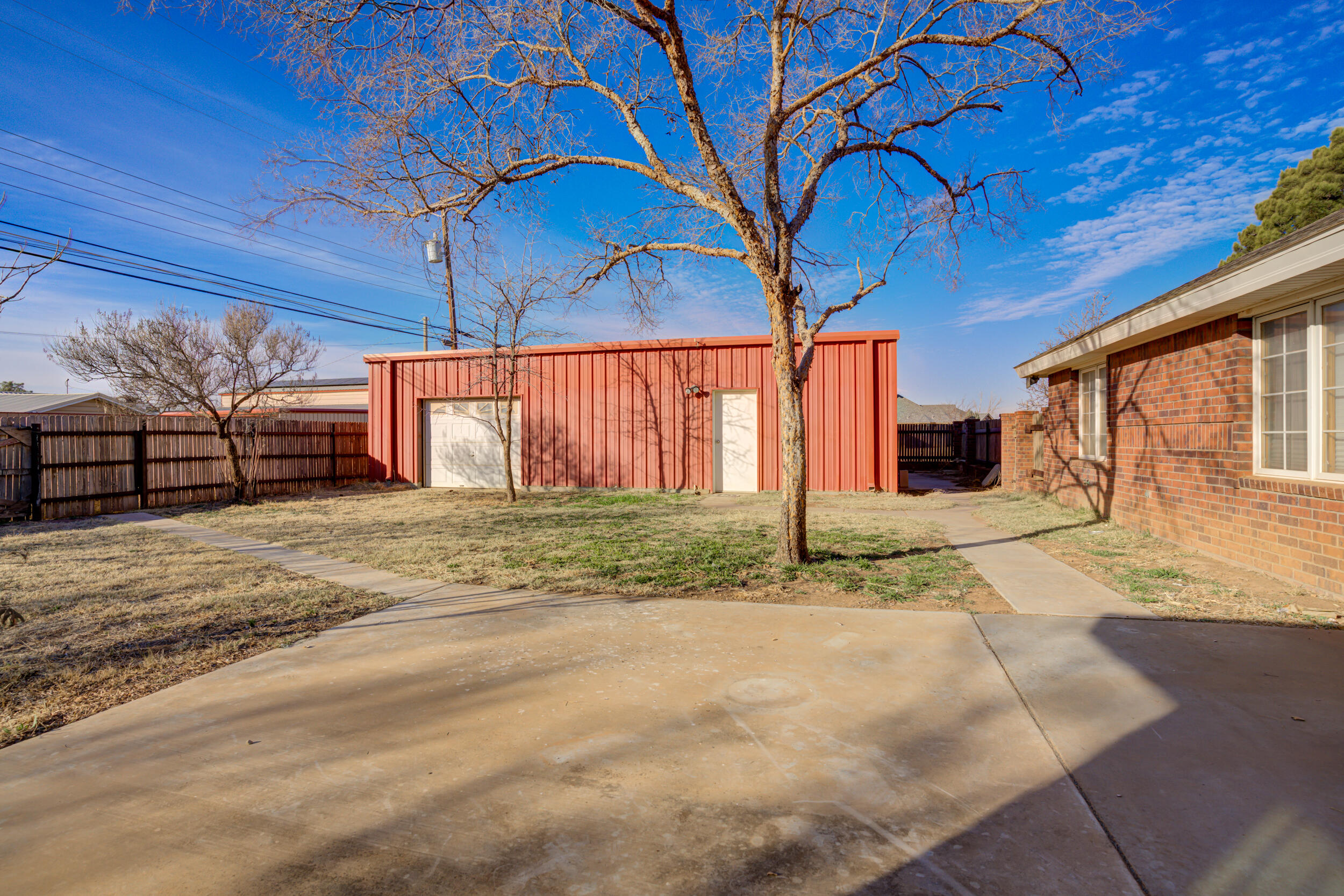 801 19th Street Seagraves, TX 79359 - Photo 6 of 24 a view of a backyard of a house