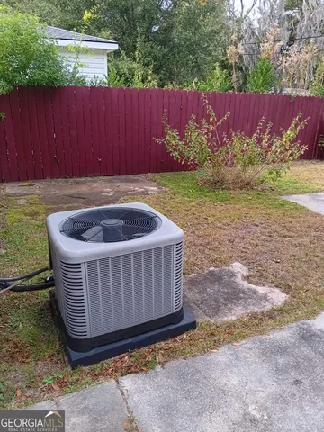 a wooden fence in the backyard