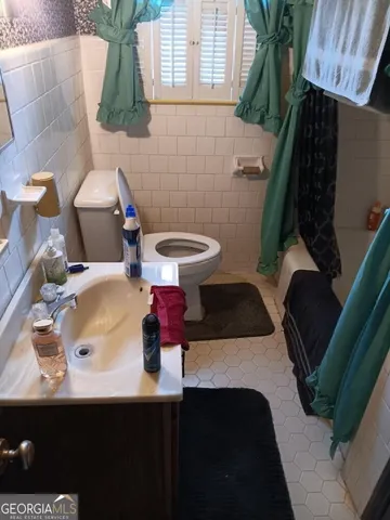 a bathroom with a sink and a toilet