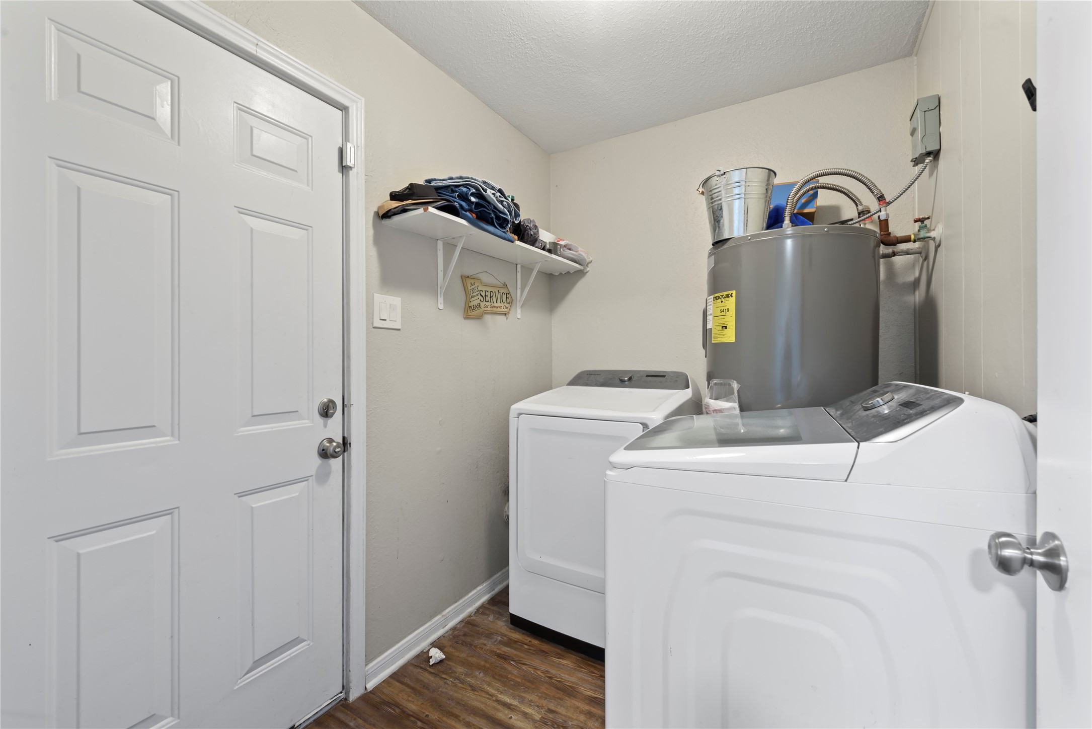 242 St Finans Way Houston, TX 77015 - Photo 22 of 25 a utility room with dryer and washer
