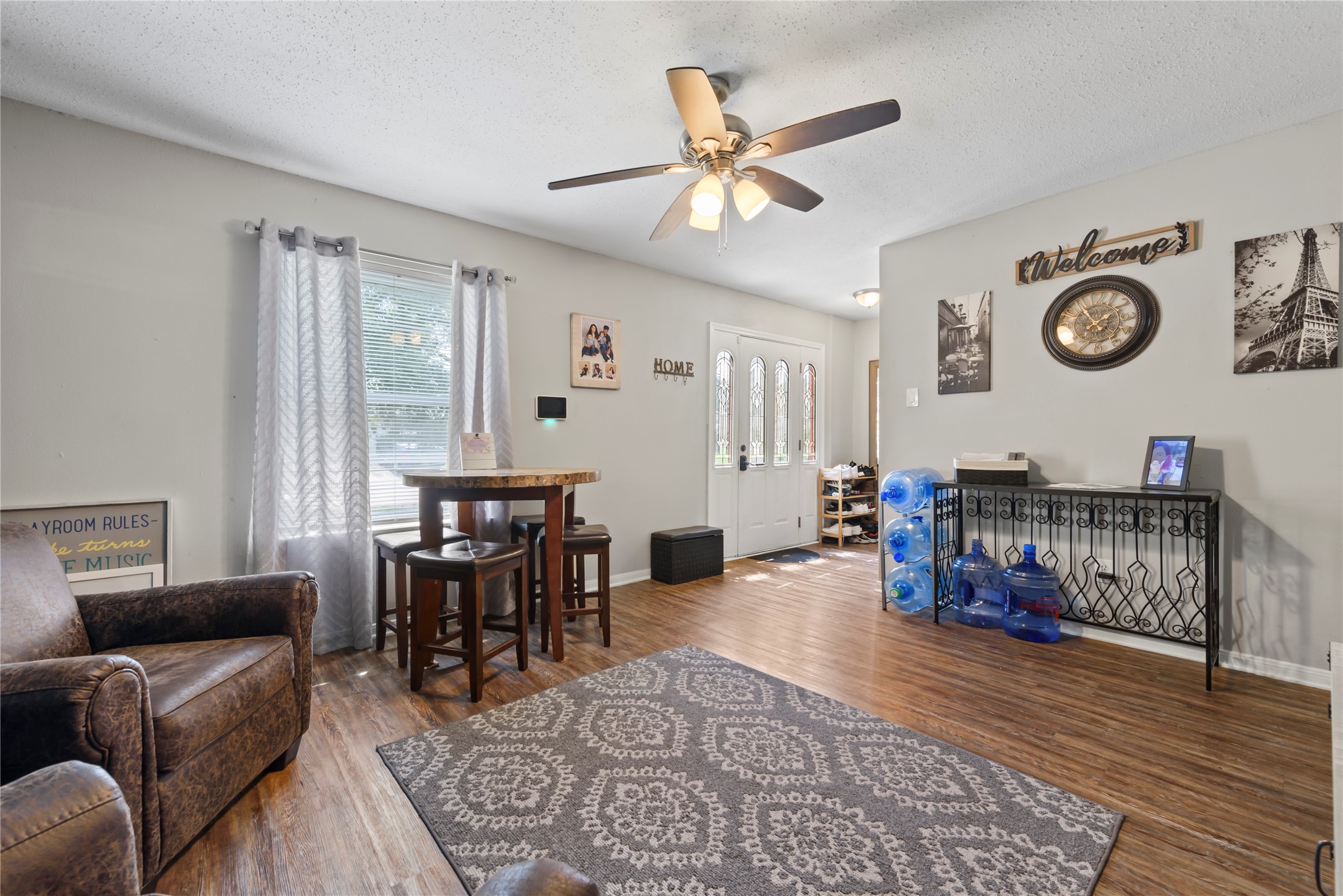 242 St Finans Way Houston, TX 77015 - Photo 9 of 25 a living room with furniture and a window