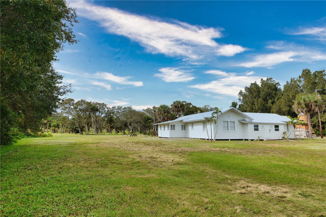 9185 Highway 1 Sebastian, FL 32958 - Photo 15 of 30 a view of a house with a yard