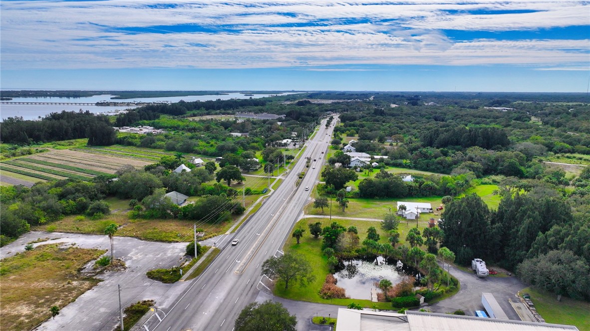 9185 Highway 1 Sebastian, FL 32958 - Photo 5 of 30 a view of a city with lots of residential buildings ocean and mountain view in back