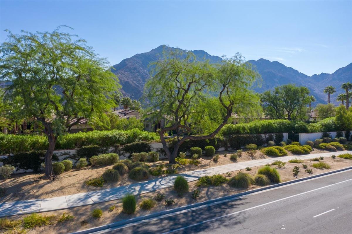 52695 Avenida Bermudas La Quinta, CA 92253 - Photo 13 of 49 a view of a bench under an umbrella